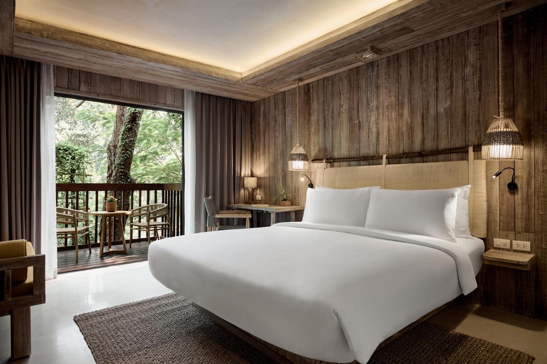 Premium Zimmer mit Kingsize-Bett und Gartenblick