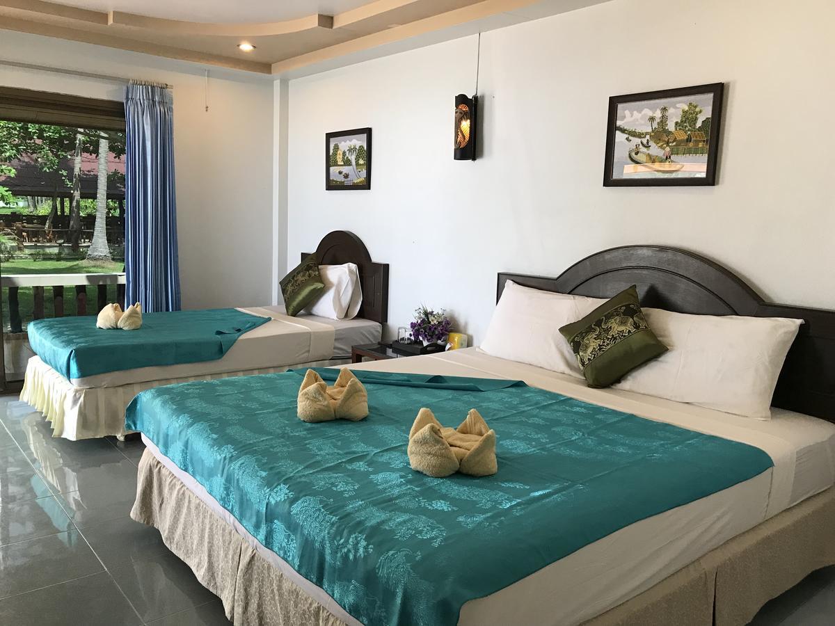 Dreibettzimmer mit Meerblick